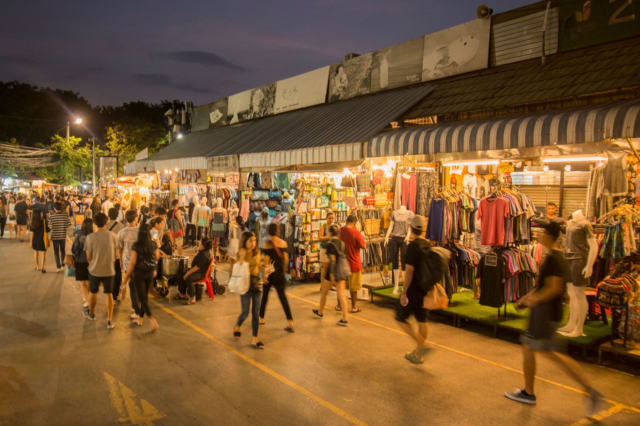 Crowds and shops inside Chatuchak Weekend Market in Bangkok