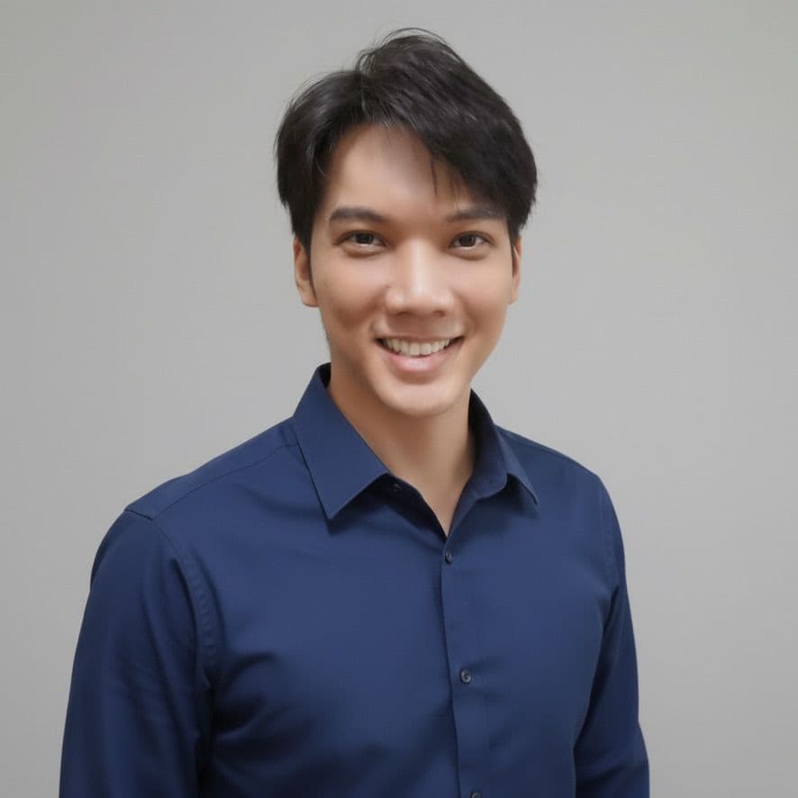 Nathawut Niemsuwan, Founder and Developer of SiamWalks, smiling in a professional navy blue shirt.