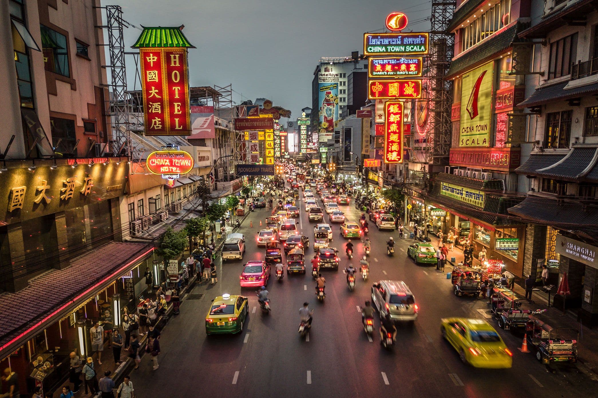 Neon signs and street food stalls in Yaowarat at night